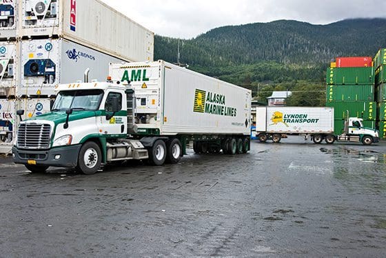 Ultra-high capacity shipping containers in transit.