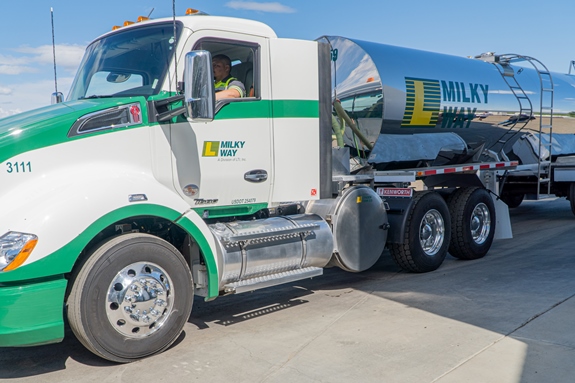 Tanker trailer transporting milk via ground shipping.
