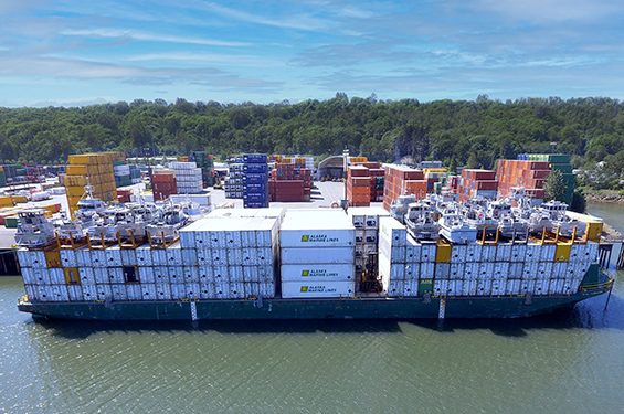 Barge loaded with temperature-controlled shipping containers