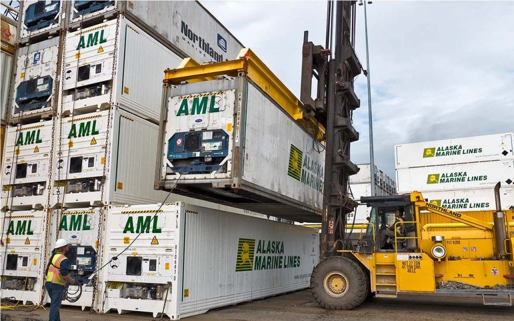 Loading refrigerated containers for shipping seafood from Western Alaska