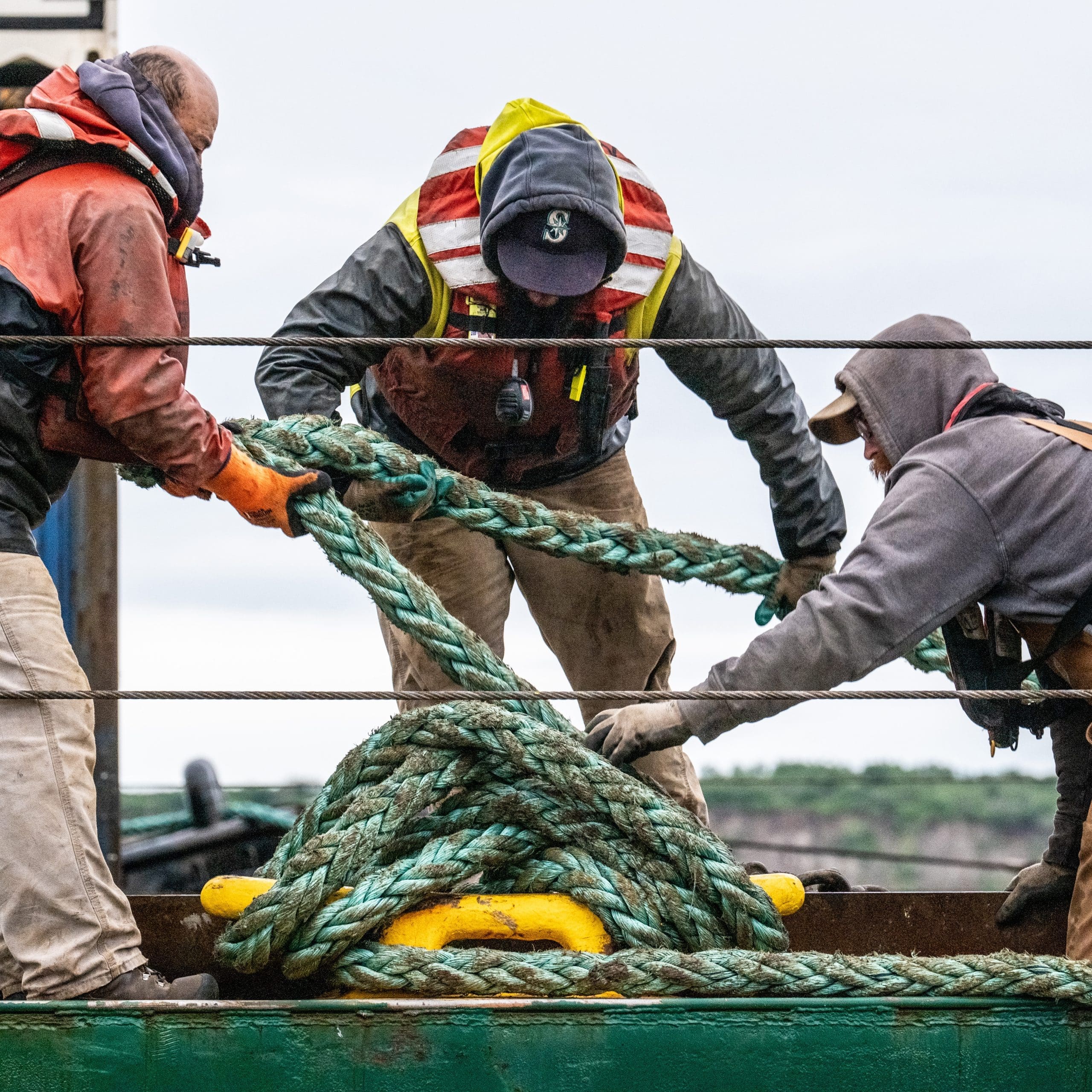 Lynden employees working on barge